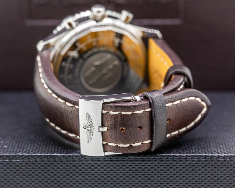 The stainless steel copy watches have brown straps.
